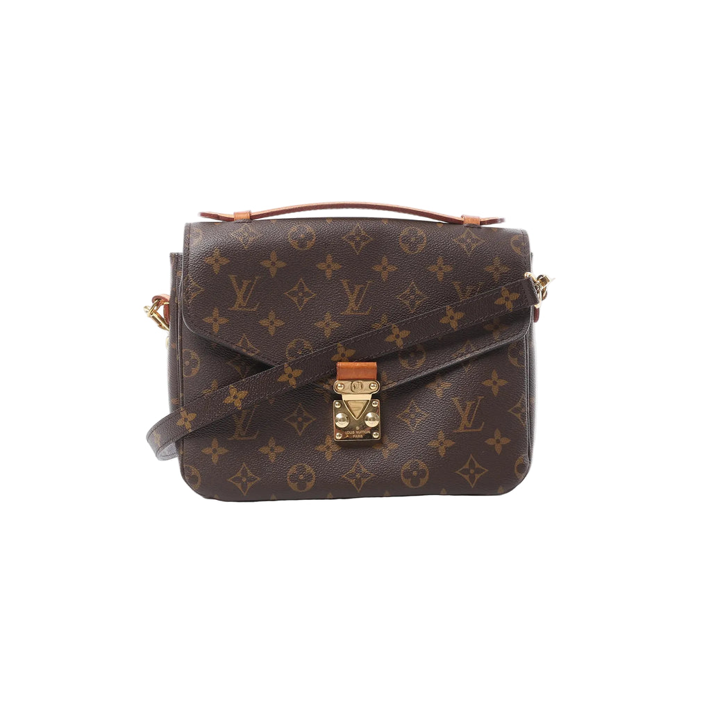 Louis Vuitton Pochette Métis MM brown Monogram canvas crossbody with top handle, front flap and gold-tone S-lock closure, and detachable strap, front view on white background