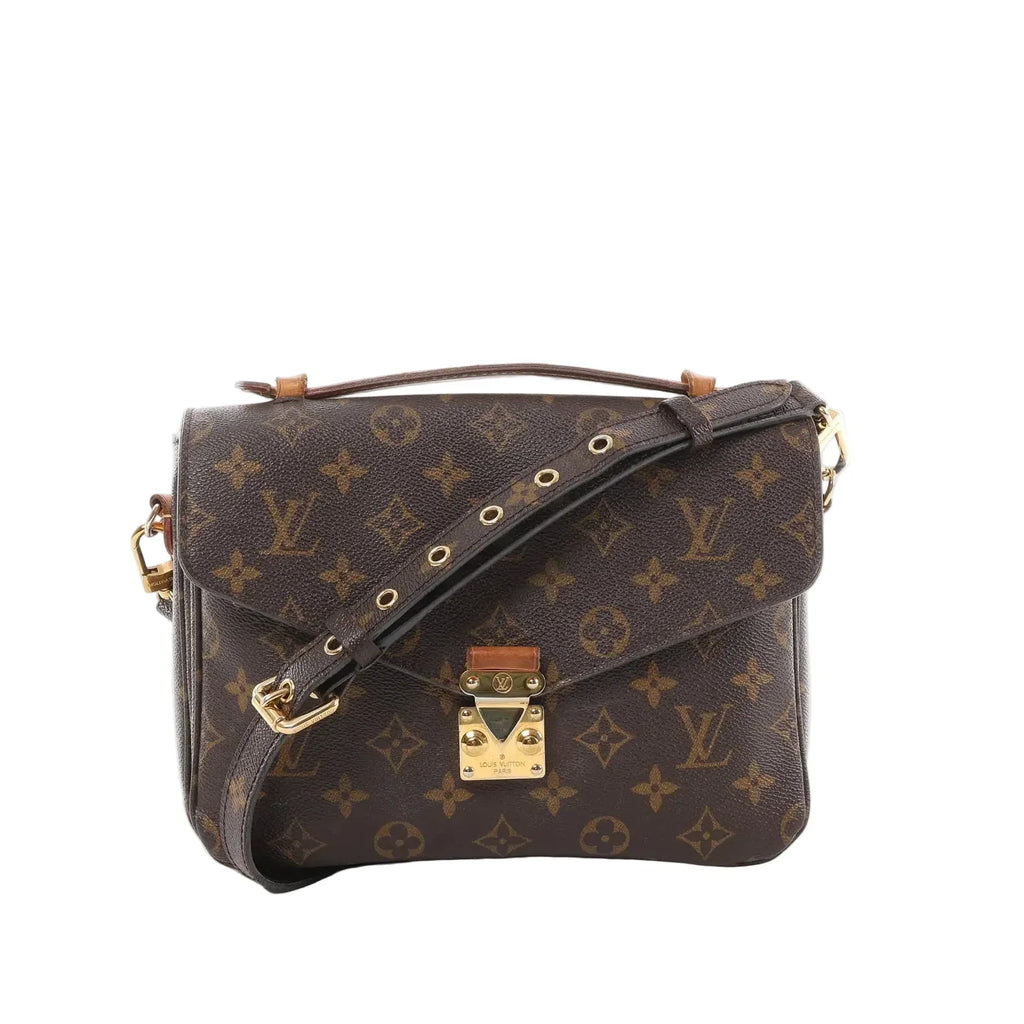 Louis Vuitton Monogram canvas Pochette Métis crossbody bag with top handle, adjustable strap with gold eyelets, and gold-tone S-lock front closure