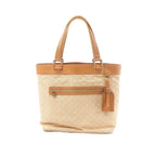 Front view of Louis Vuitton Mini Lucille GM in beige Monogram linen with tan leather trim, long shoulder straps, front zip pocket and hanging leather tag on a white background.