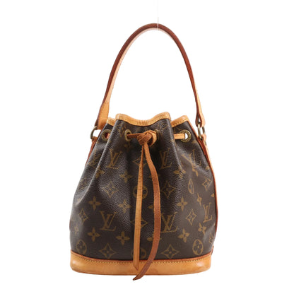 Louis Vuitton Noé Mini shoulder bag M99162 in brown Monogram Canvas with natural leather trim, adjustable shoulder strap, and drawstring top closure.