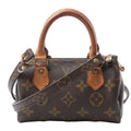 Louis Vuitton Speedy Nano handbag in brown Monogram canvas with tan leather top handles, detachable shoulder strap and top zip closure.