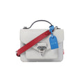 Louis Vuitton Monceau Epi Neo handbag in white textured leather with a black top handle, red shoulder strap, blue luggage tag and silver-tone clasp.