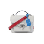 Louis Vuitton Monceau Epi Neo handbag in white textured leather with a black top handle, red shoulder strap, blue luggage tag and silver-tone clasp.