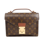 Front view of an authentic Louis Vuitton Monceau M51187 handbag in brown Monogram canvas, featuring gold-tone S-lock closure, top handle, and LV monogram print.
