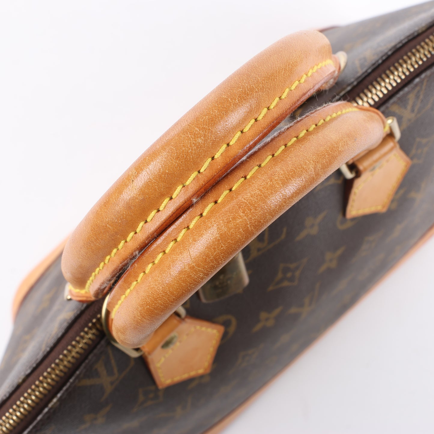 Sac à main Louis Vuitton Alma PM en toile Monogram M51130