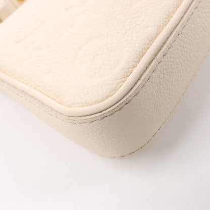 Louis Vuitton Monogram Empreinte Easy Pouch Handbag in Beige M81066