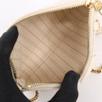 Louis Vuitton Monogram Empreinte Easy Pouch Handbag in Beige M81066