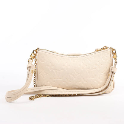 Louis Vuitton Monogram Empreinte Easy Pouch Handbag in Beige M81066