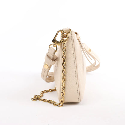 Louis Vuitton Monogram Empreinte Easy Pouch Handbag in Beige M81066