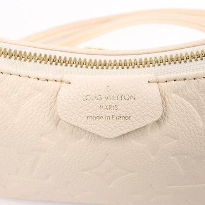 Louis Vuitton Monogram Empreinte Easy Pouch Handbag in Beige M81066