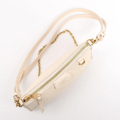 Louis Vuitton Monogram Empreinte Easy Pouch Handbag in Beige M81066