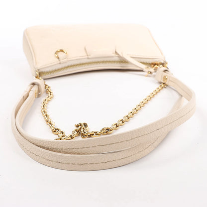 Louis Vuitton Monogram Empreinte Easy Pouch Handbag in Beige M81066