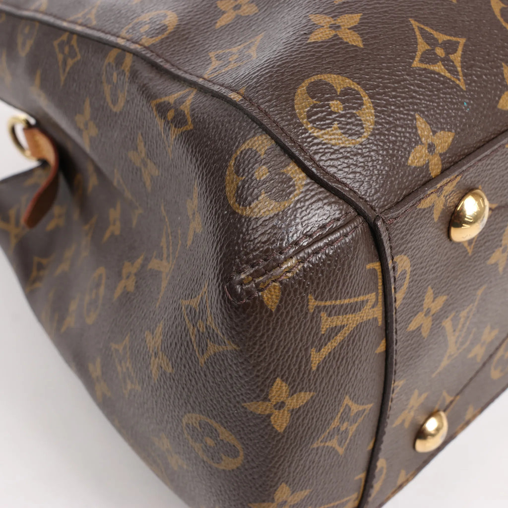 Louis Vuitton Montaigne GM Monogram Canvas Handbag in Brown