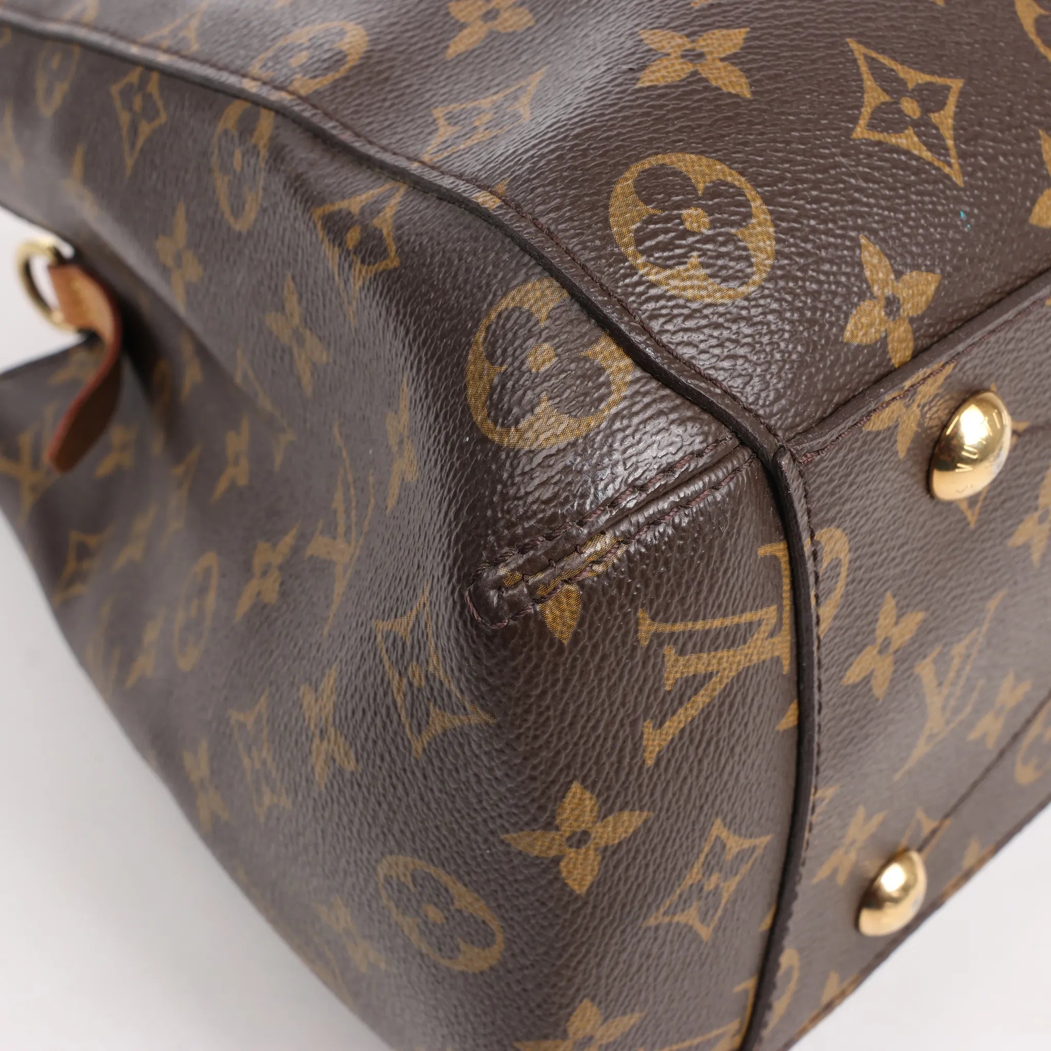 Louis Vuitton Montaigne GM Monogram Canvas Handbag in Brown
