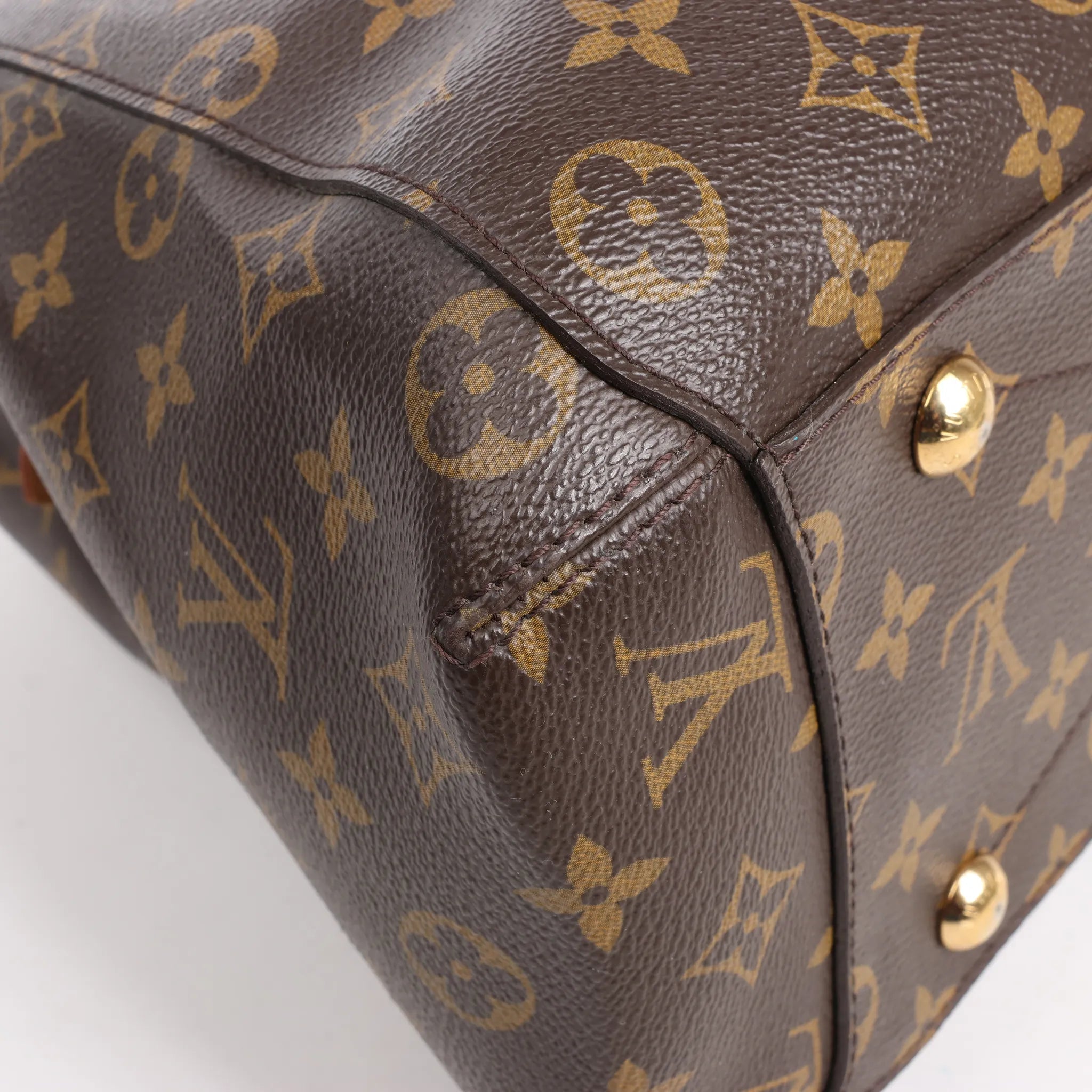 Louis Vuitton Montaigne GM Monogram Canvas Handbag in Brown