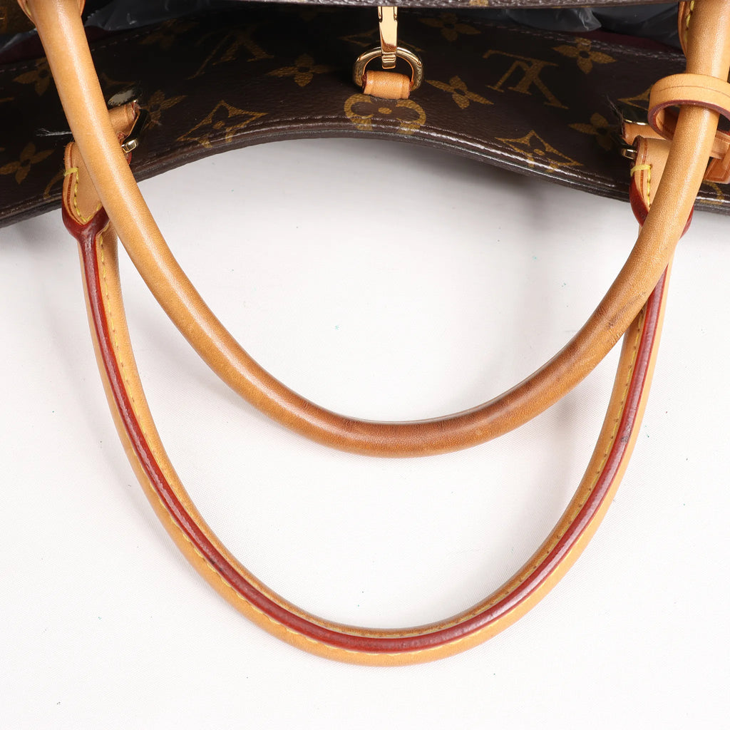 Louis Vuitton Montaigne GM Monogram Canvas Handbag in Brown