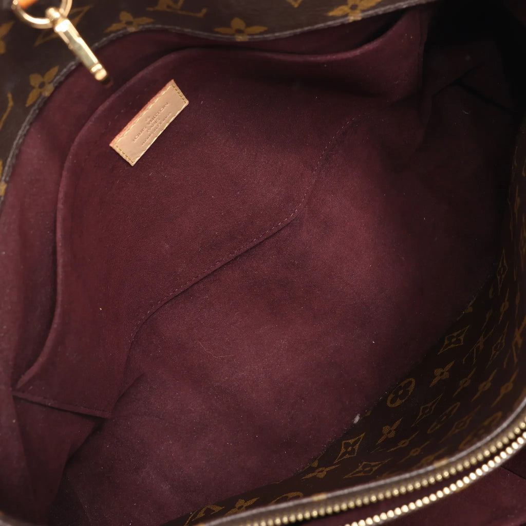 Louis Vuitton Montaigne GM Monogram Canvas Handbag in Brown