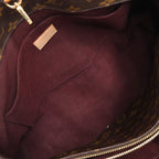 Louis Vuitton Montaigne GM Monogram Canvas Handbag in Brown
