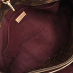 Louis Vuitton Montaigne GM Monogram Canvas Handbag in Brown