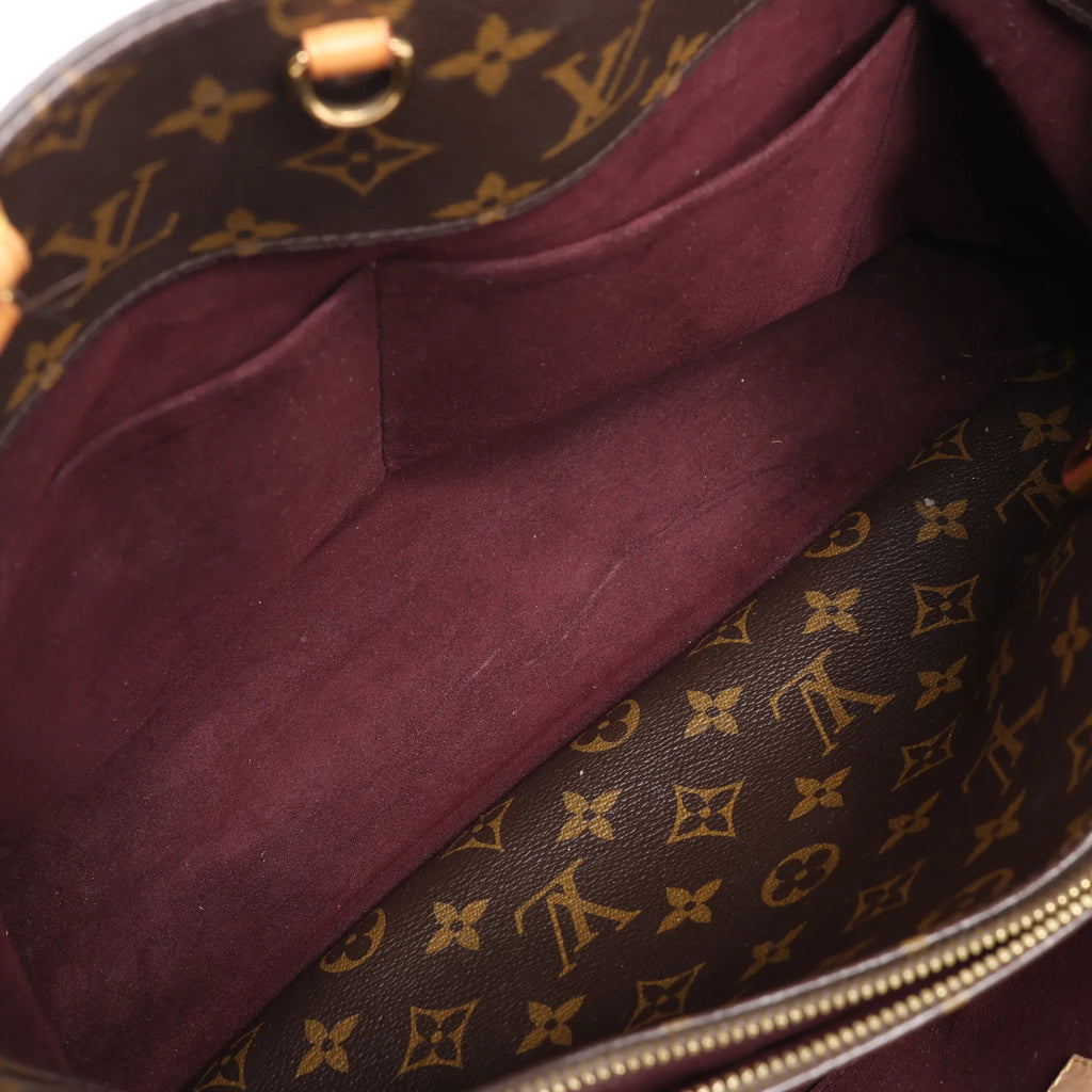 Louis Vuitton Montaigne GM Monogram Canvas Handbag in Brown