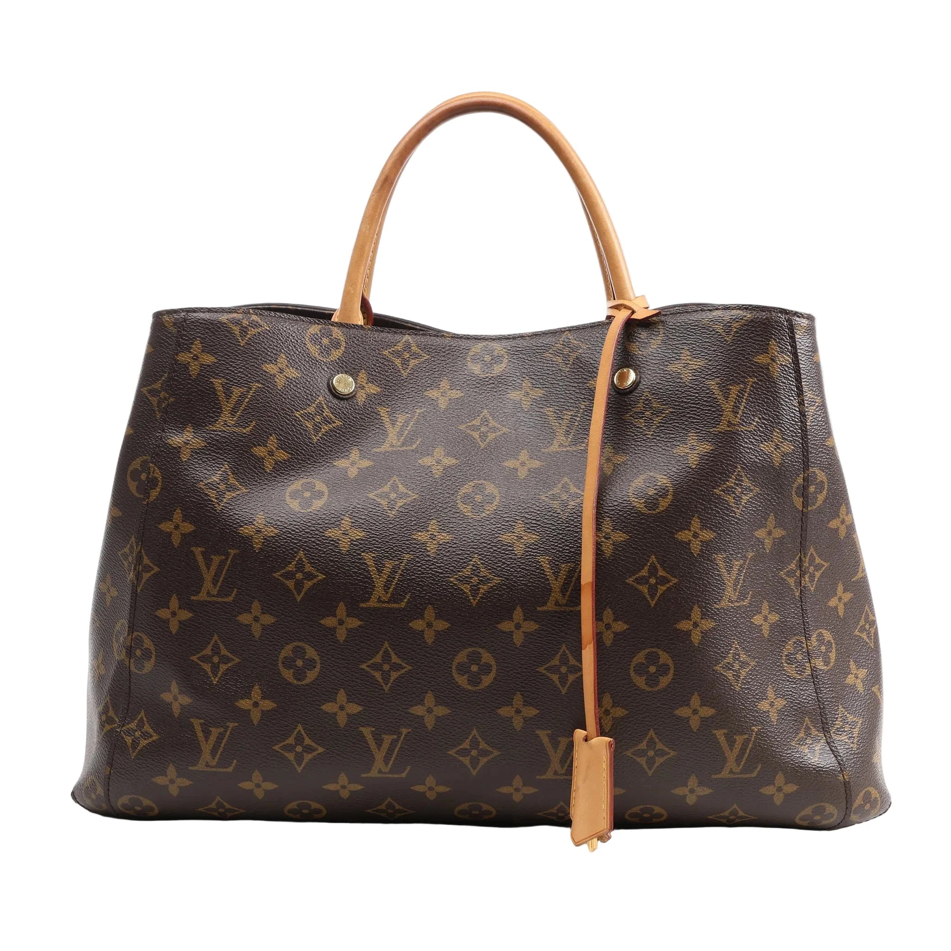Louis Vuitton Monogram Montaigne GM Handbag featuring brown LV monogram canvas, tan leather top handles and trim, gold-tone hardware, and detachable shoulder strap, displayed on a white background.