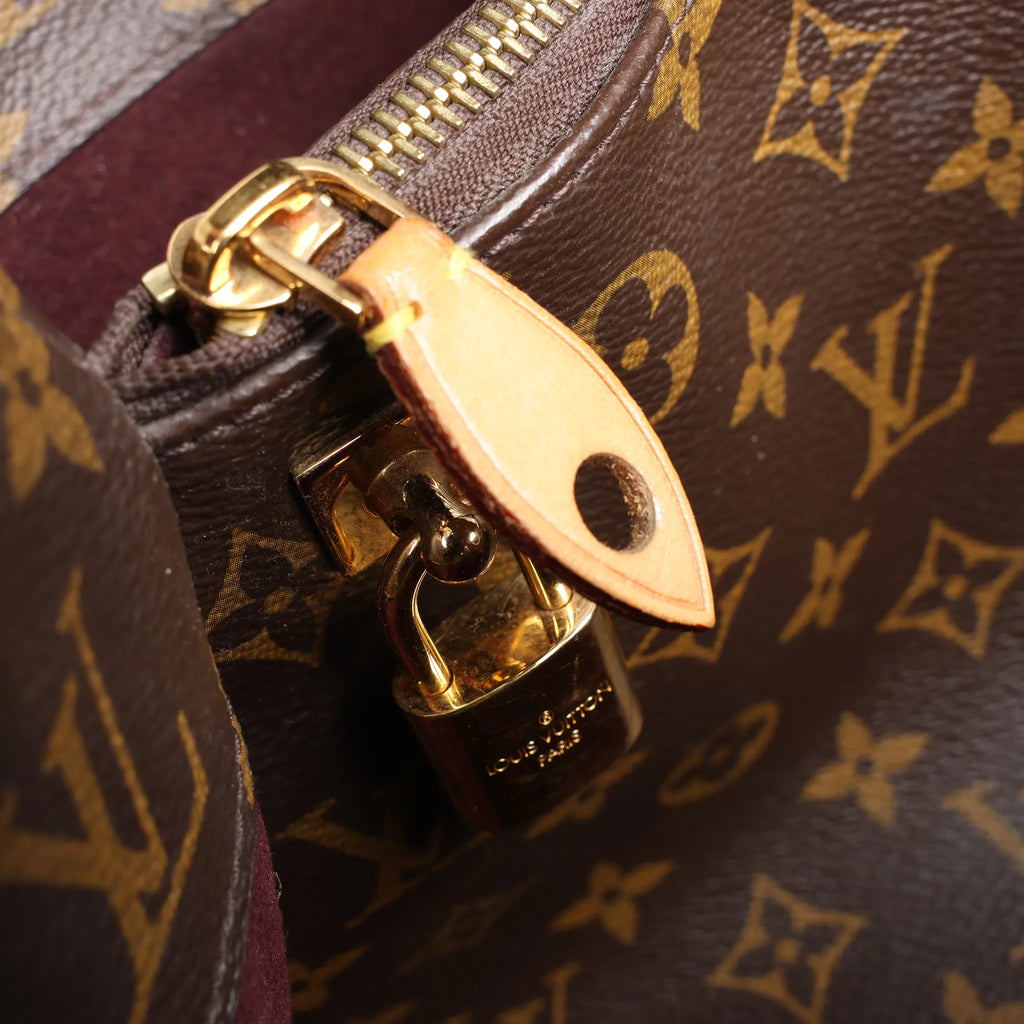 Louis Vuitton Montaigne GM Monogram Canvas Handbag in Brown