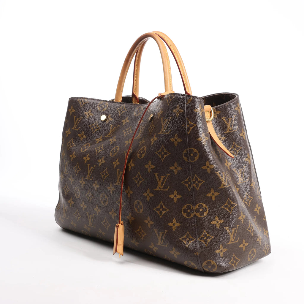 Louis Vuitton Montaigne GM Monogram Canvas Handbag in Brown