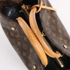 Louis Vuitton Montaigne GM Monogram Canvas Handbag in Brown