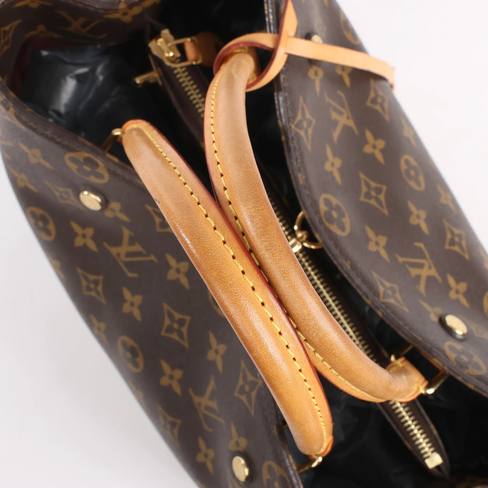 Louis Vuitton Montaigne GM Monogram Canvas Handbag in Brown