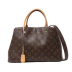 Front view of Louis Vuitton Monogram Montaigne MM 2Way Handbag M41056 in brown Monogram canvas with natural leather top handles, detachable shoulder strap, and gold-tone hardware, displayed against a white background.