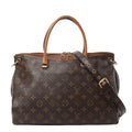 Front view of the Louis Vuitton Monogram Pallas MM 2Way Handbag M40907 in brown, featuring classic LV monogram canvas, natural cowhide leather top handles, a detachable shoulder strap, gold-tone hardware, and dual zipper closure.