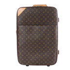 Louis Vuitton Pegase 55 brown Monogram travel bag with tan leather corner detail, top handle, front pocket and rolling suitcase shape.