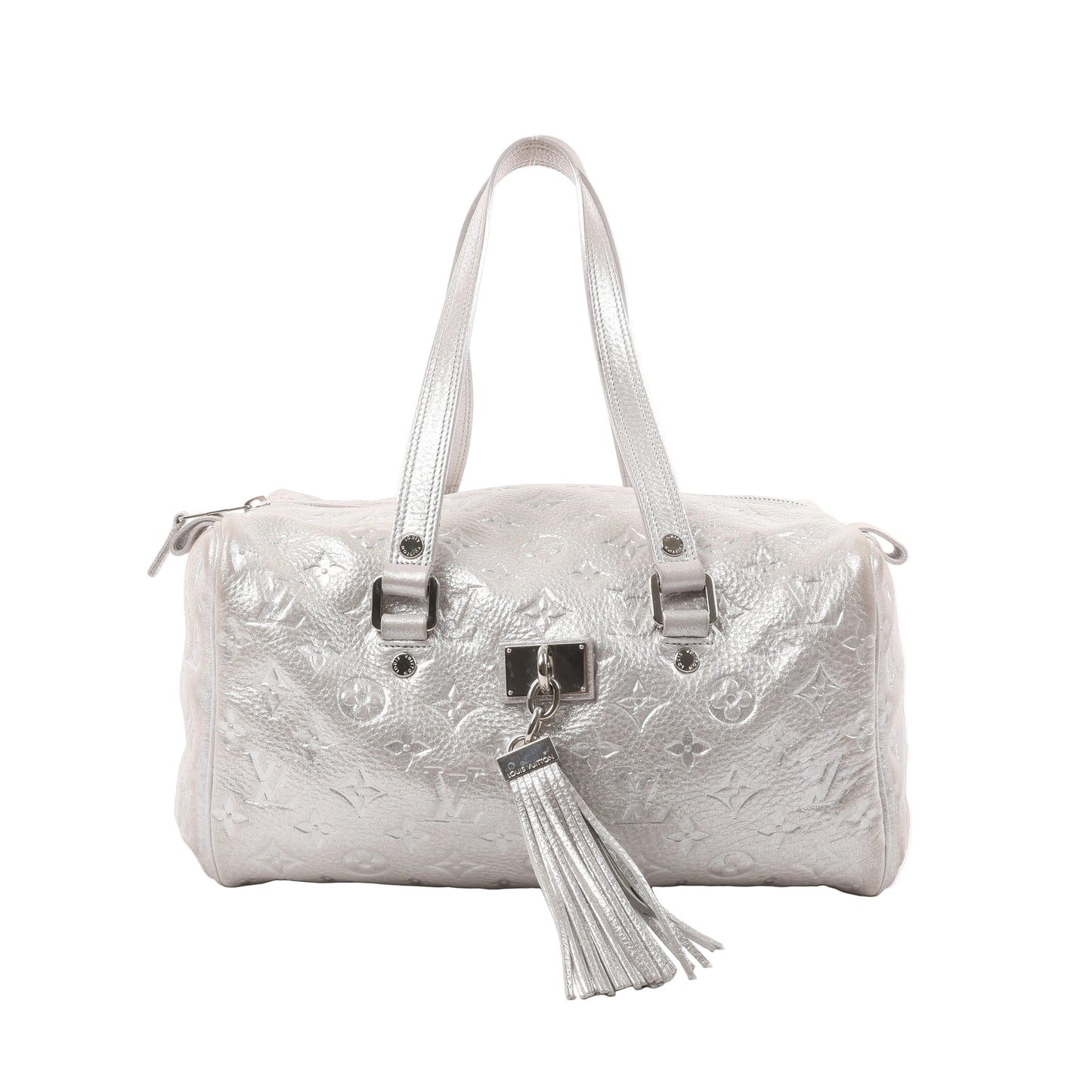 Louis Vuitton Comète Limited Edition shoulder bag in shimmer silver Monogram-embossed leather, featuring dual handles, front tassel accent, and metallic finish.