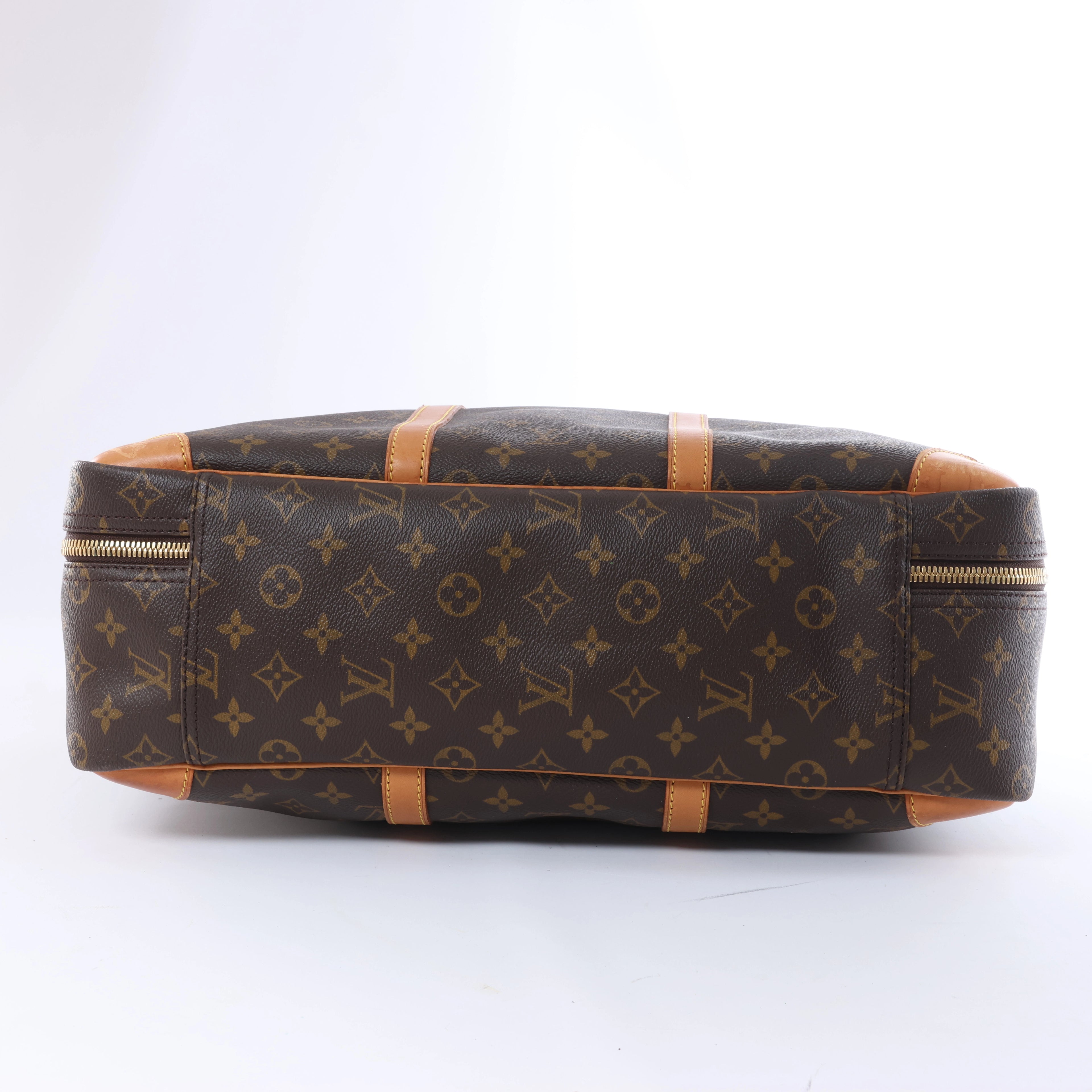 Bolso de viaje Louis Vuitton Sirius 65 Monogram Canvas en marrón