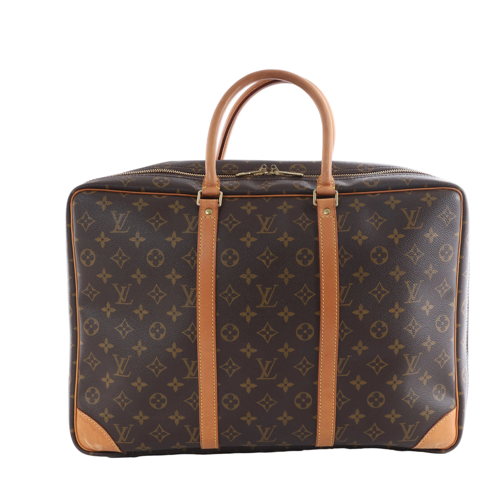 Louis Vuitton Sirius 45 travel bag in brown Monogram canvas with natural leather trim, double top handles and a rectangular silhouette.