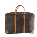 Louis Vuitton Sirius 45 travel bag in brown Monogram canvas with natural leather trim, double top handles and a rectangular silhouette.