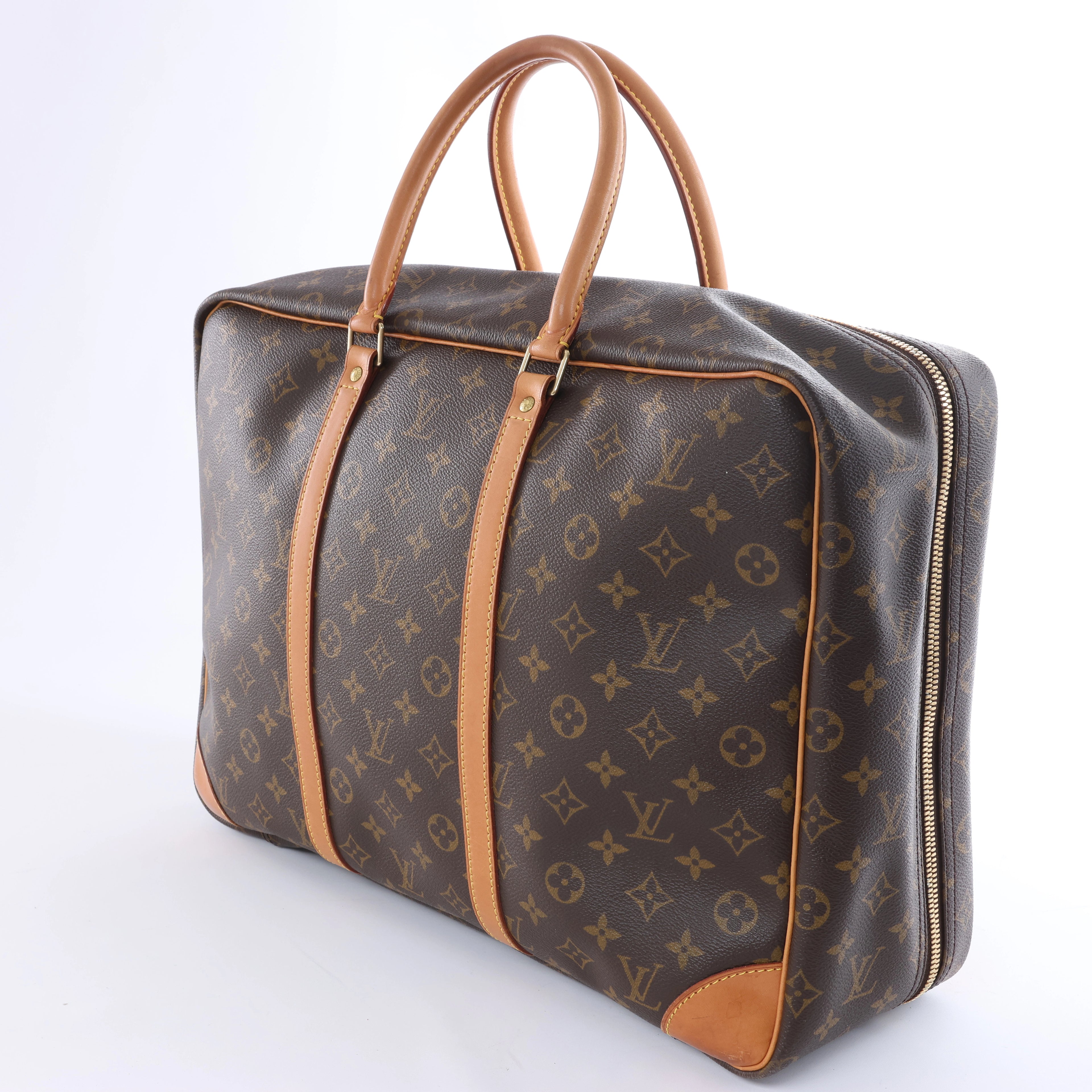 Bolso de viaje Louis Vuitton Sirius 65 Monogram Canvas en marrón