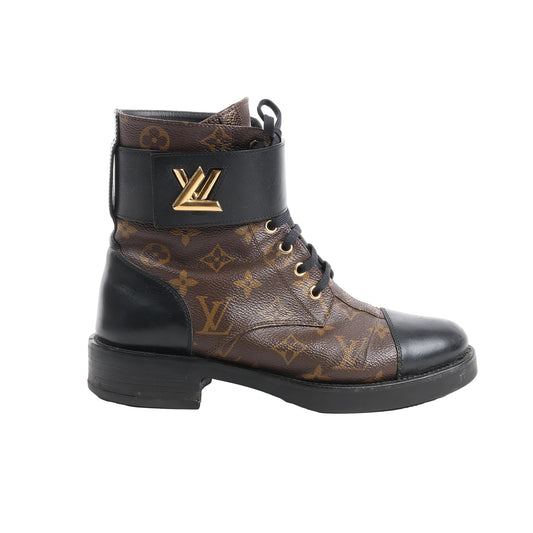 Louis Vuitton Monogram Wonderland Flat Ranger Boots in black and brown, size 39 EU, featuring Monogram canvas, smooth black leather accents, gold-tone LV logo on ankle strap, and lace-up front, displayed in profile against a white background.