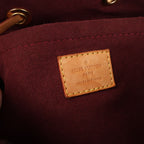Mochila Louis Vuitton Monsley Monogram de lona marrón M43431