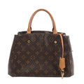Louis Vuitton Montaigne BB handbag in brown Monogram canvas with tan leather top handles and hanging leather key clochette on white background