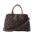 Louis Vuitton Montaigne BB handbag in brown Monogram canvas with tan rolled handles, detachable shoulder strap and gold-tone hardware.