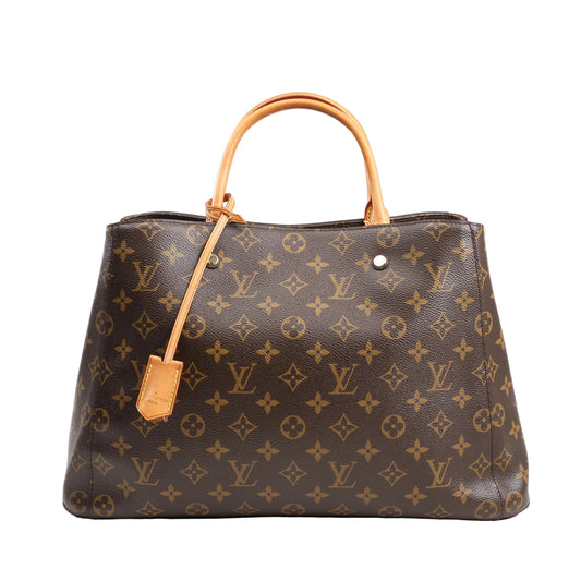 Louis Vuitton Monogram Montaigne GM 2Way Handbag M41067 in brown coated canvas with natural leather top handles, gold-tone hardware, and a structured silhouette, shown against a plain white background.