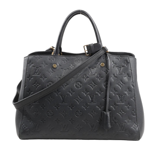 Louis Vuitton Monogram Empreinte Montaigne GM 2Way Handbag M41069 in black embossed leather with gold-tone hardware, dual top handles, detachable shoulder strap, and structured silhouette, shown on white background.