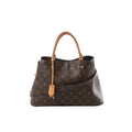 Louis Vuitton Montaigne MM Monogram canvas handbag with natural leather top handles, detachable shoulder strap, and hanging leather tag.
