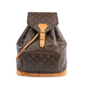 The Louis Vuitton Monogram Canvas Montsouris Vintage GM Backpack is a classic travel companion, crafted from iconic monogram canvas with natural leather trim. Spacious and stylish, it’s perfect for hands-free functionality with timeless LV appeal.