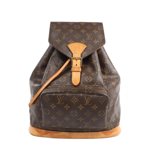 The Louis Vuitton Monogram Canvas Montsouris Vintage GM Backpack is a classic travel companion, crafted from iconic monogram canvas with natural leather trim. Spacious and stylish, it’s perfect for hands-free functionality with timeless LV appeal.