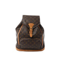 A true vintage essential: the Louis Vuitton Montsouris GM backpack in classic Monogram canvas with vachetta leather trim. Spacious yet streamlined, with a flap-and-buckle closure and front zip pocket for easy access on the go.