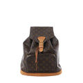 Front view of Louis Vuitton Montsouris GM brown Monogram canvas backpack with vachetta leather buckle strap and front zip pocket on a white background.