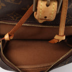 Louis Vuitton Montsouris MM Monogram Backpack in Brown M51136