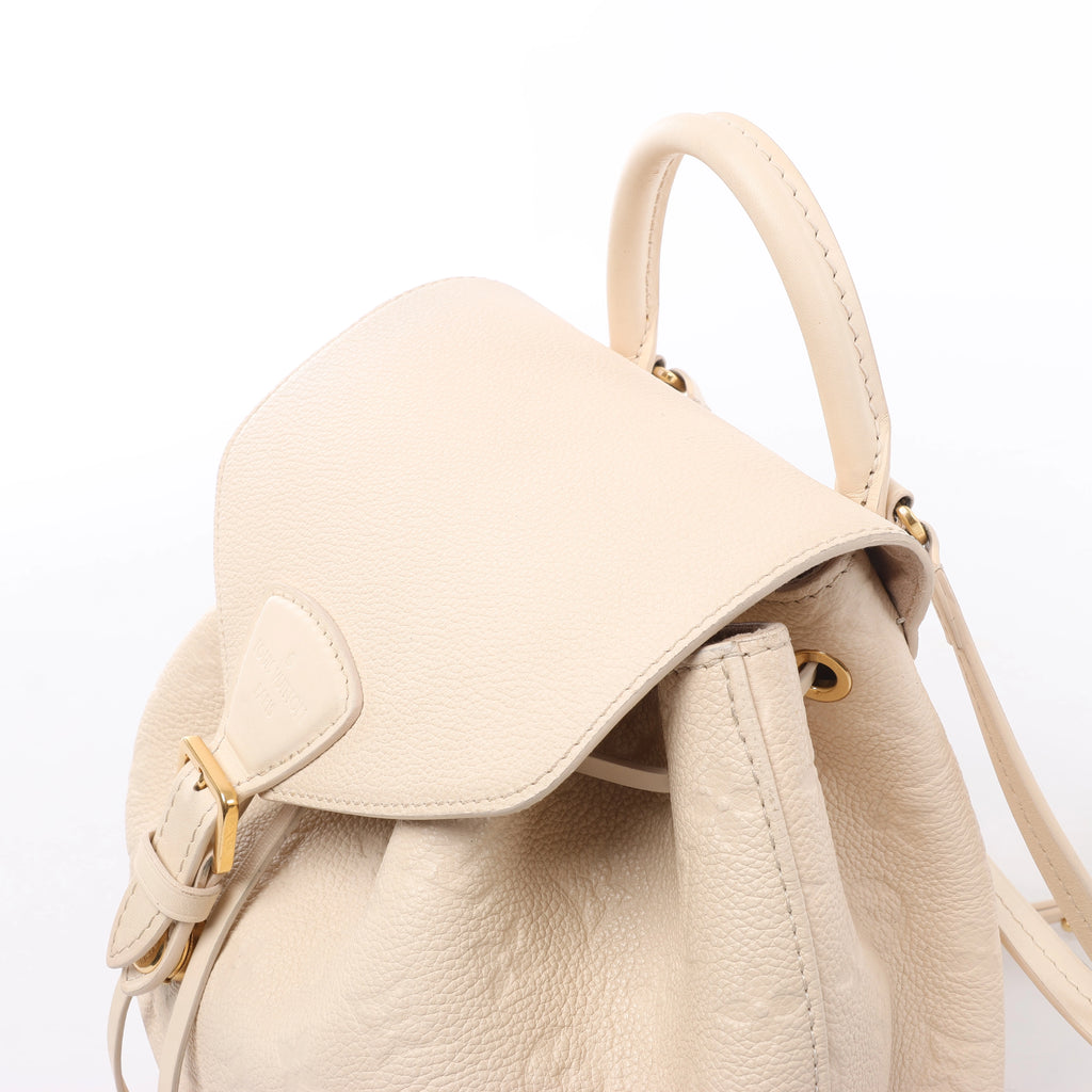 Mochila vintage de lona Louis Vuitton Montsouris MM Monogram en marrón M51136